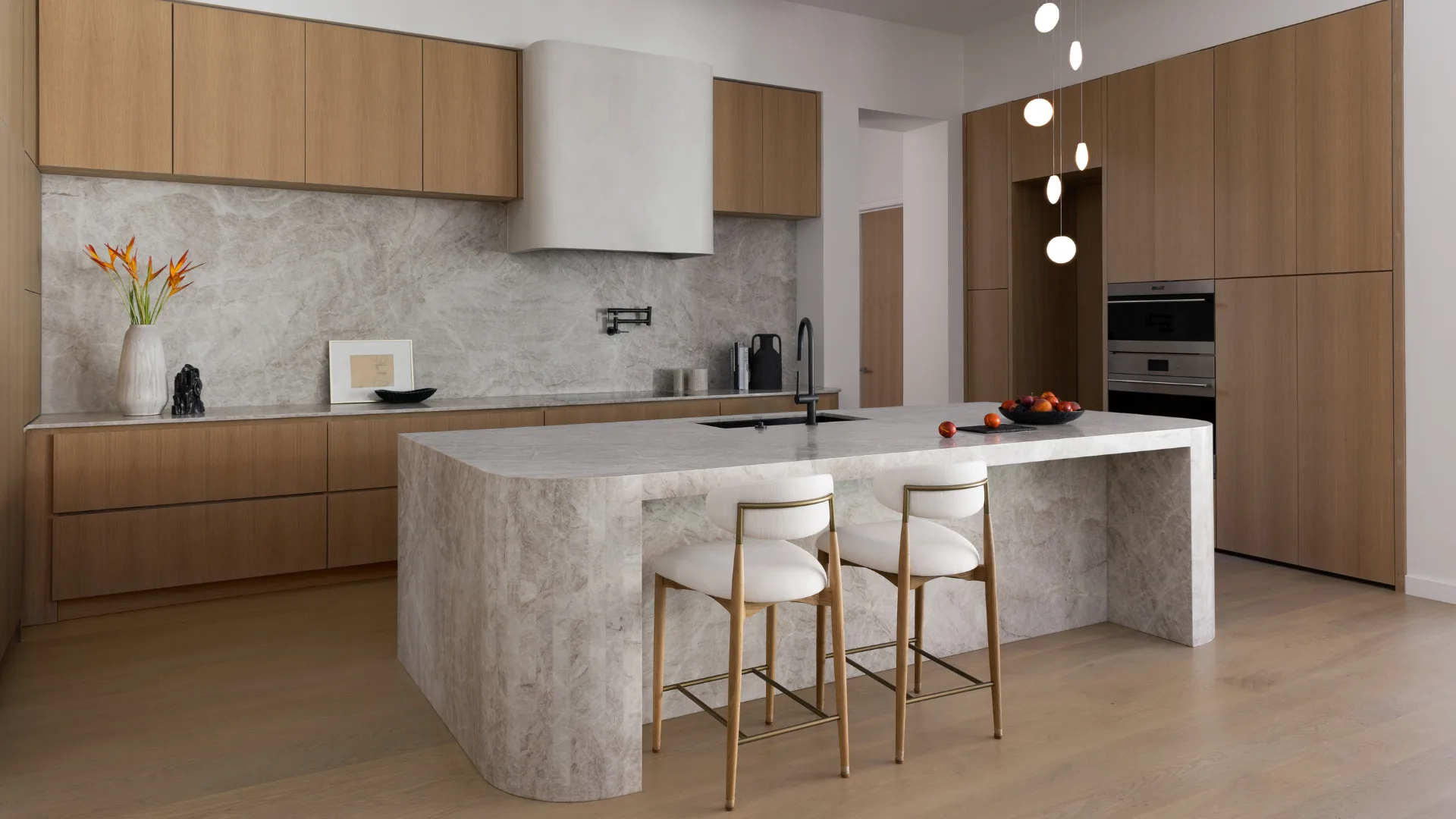 Finished kitchen with stone countertops and a full-height backsplash