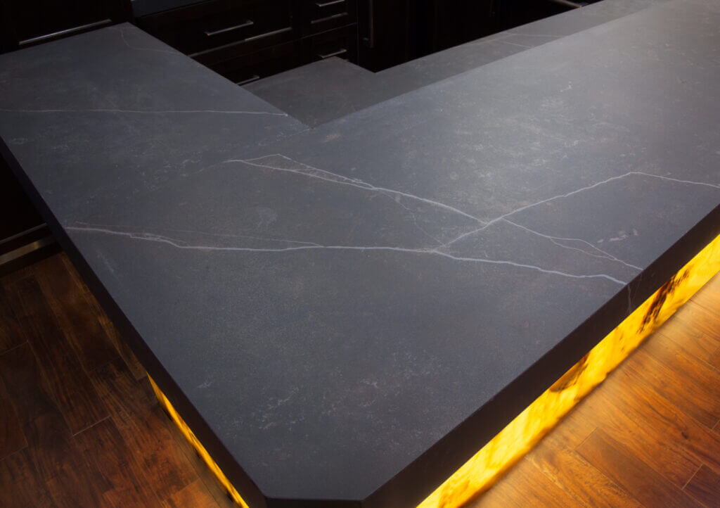 Toor_stone_countertops_dekton_onyx_austin_lakeway3-1-1024x722 (1) An Austin, Texas exotic countertop installation for a bar top and surround.