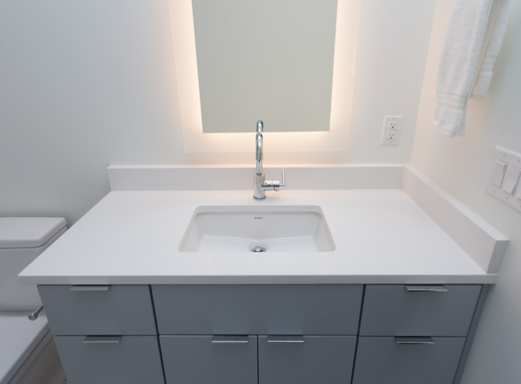 White natural stone bathroom countertops by Toor Stone located in Austin Texas near me
